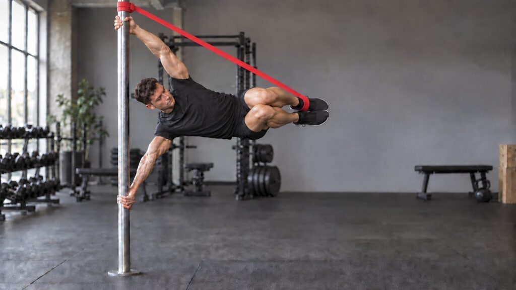 Band-Assisted-Tucked-Human-Flag