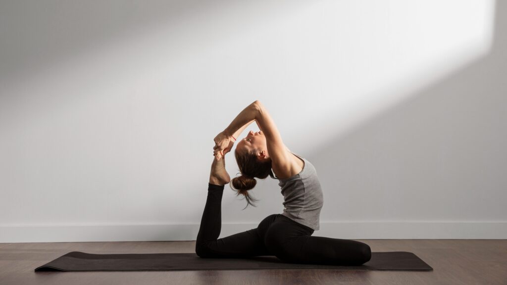 Active-woman-practicing-yoga-at-home